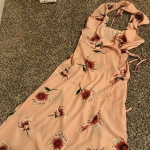 Pink sleeveless wrap dress